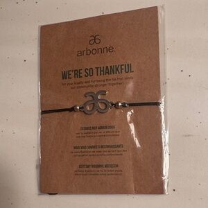 Arbonne Black Cord Bracelet with Silver Logo